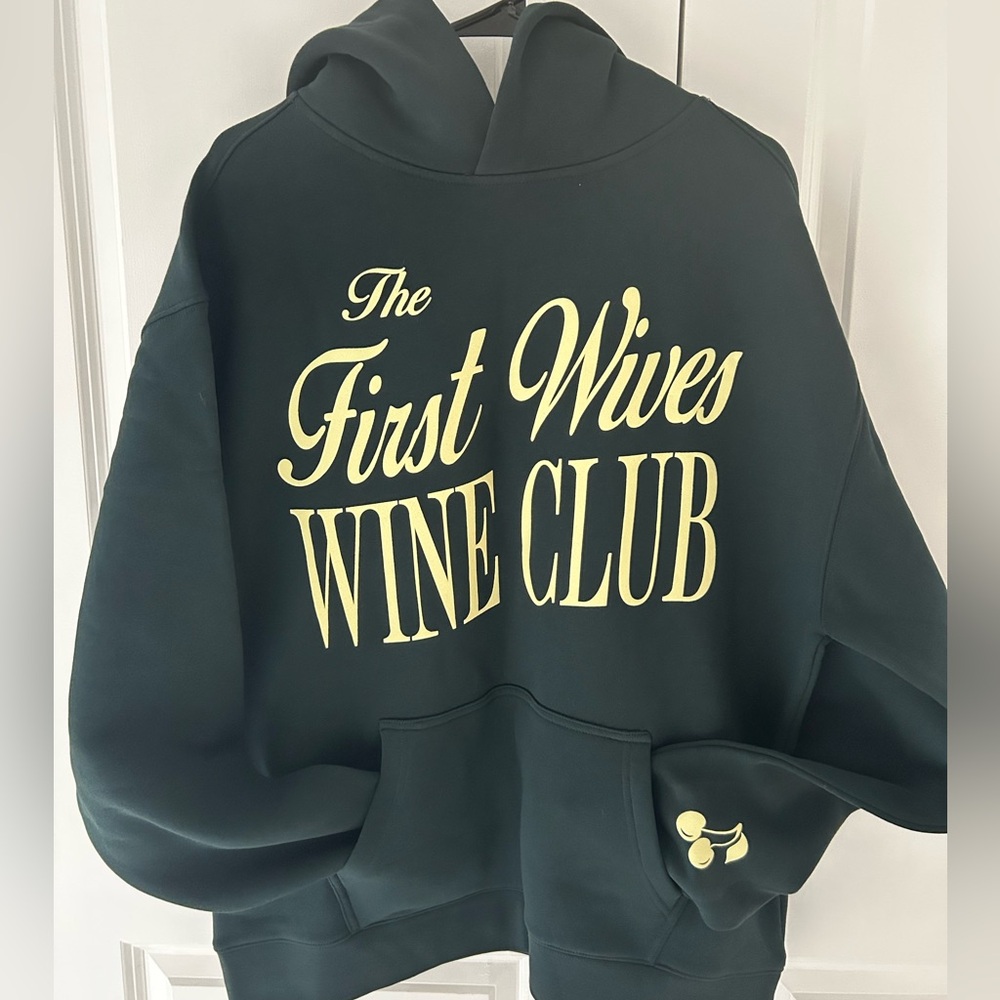 “First Wives Wine Club” hoodie.